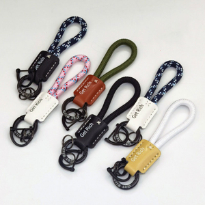Unique ‘Get Rich’ Braided Rope Leather Keychain with Stylish Rope and Metal Closure Personal Accessory